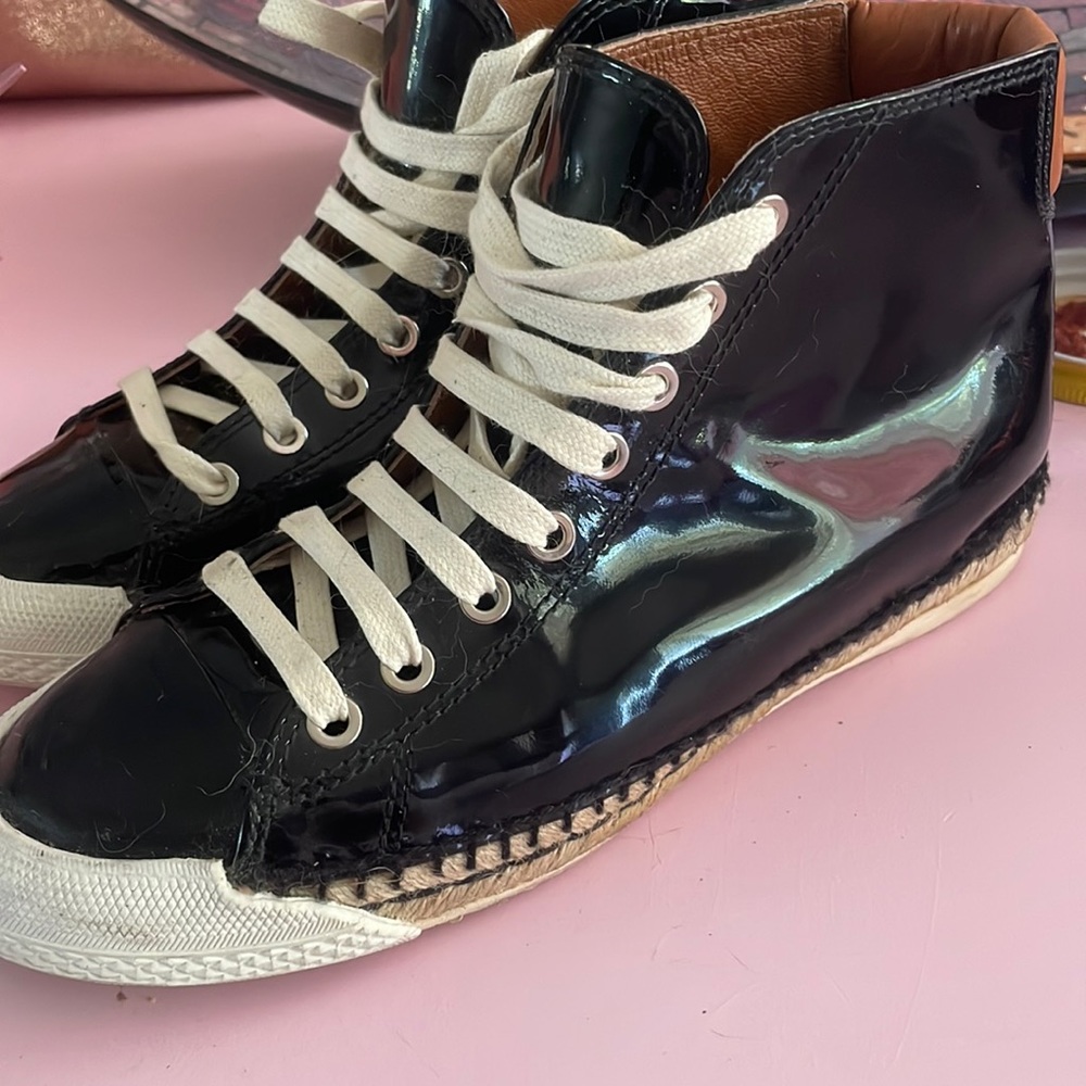 Size 38 Flamingo faux patent leather high top sneaker. Excellent condition.